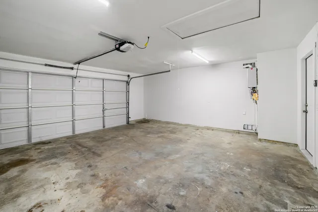 a view of a backyard with large trees