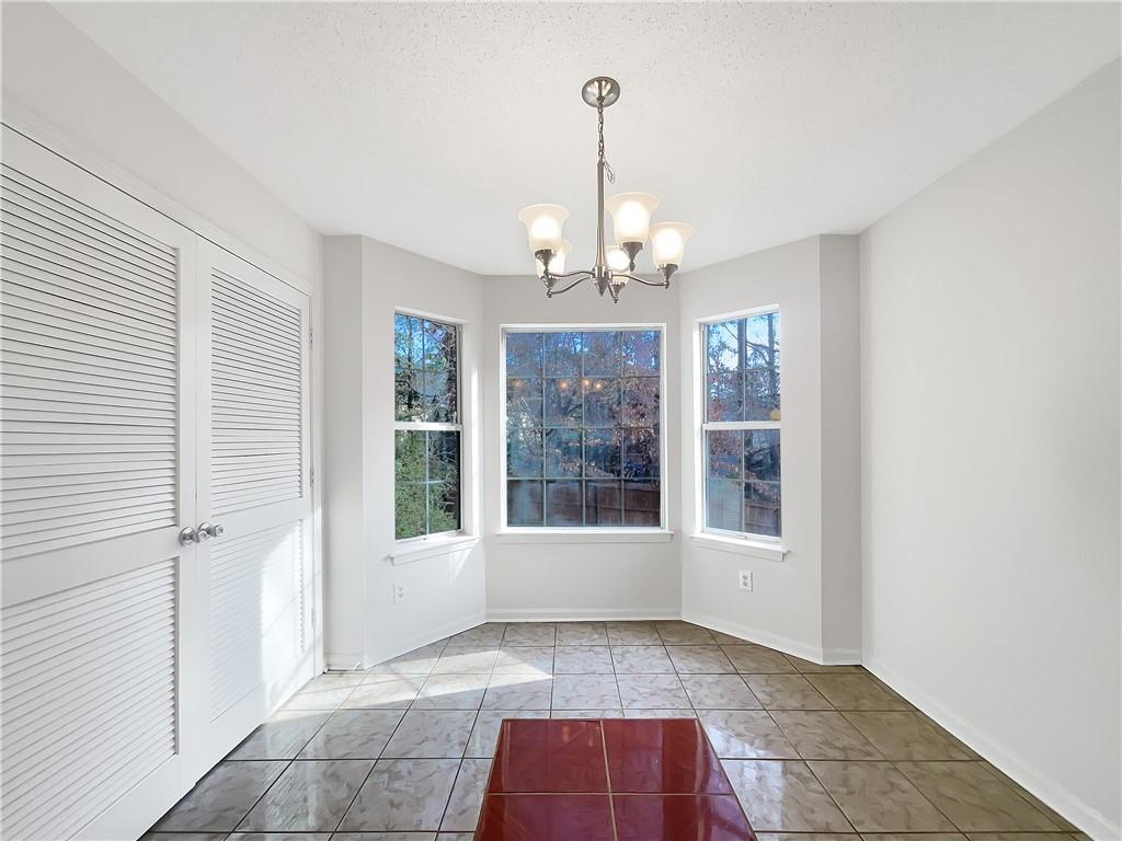 2867 Oakvale Falls Drive Decatur, GA 30034 - Photo 10 of 26 a view of an empty room with a window