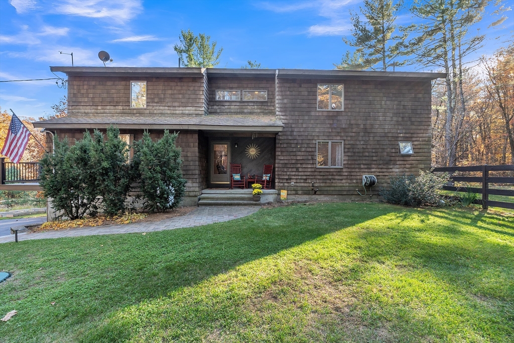 62 Coal Kiln Road Princeton, MA 01541 - Photo 1 of 41 a front view of a house with a yard