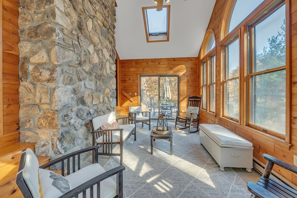 62 Coal Kiln Road Princeton, MA 01541 - Photo 11 of 41 a living room with fireplace furniture and a large window