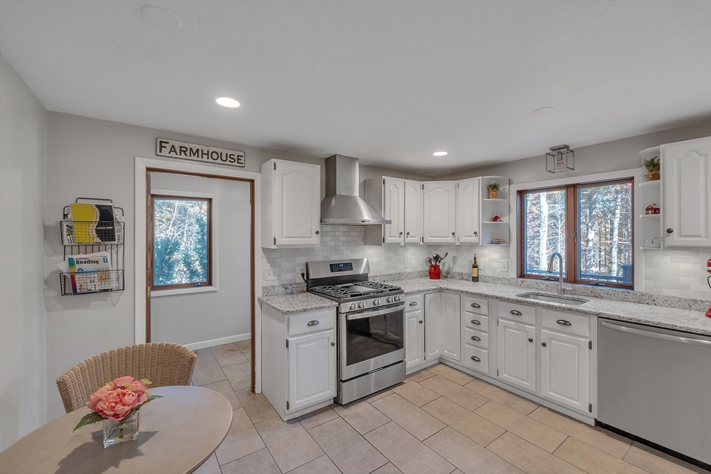 62 Coal Kiln Road Princeton, MA 01541 - Photo 13 of 41 a kitchen with granite countertop white cabinets and white appliances