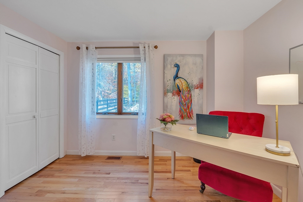 62 Coal Kiln Road Princeton, MA 01541 - Photo 18 of 41 a room with a table and a mirror