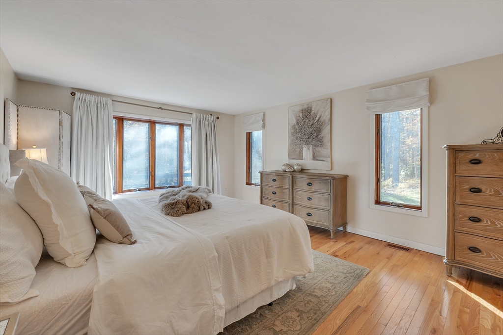 62 Coal Kiln Road Princeton, MA 01541 - Photo 19 of 41 a bedroom with a bed and a dresser