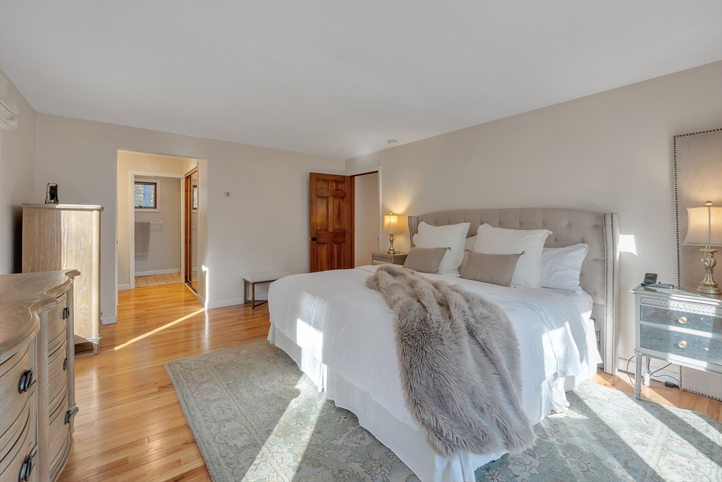 62 Coal Kiln Road Princeton, MA 01541 - Photo 21 of 41 a spacious bedroom with a bed and a couch