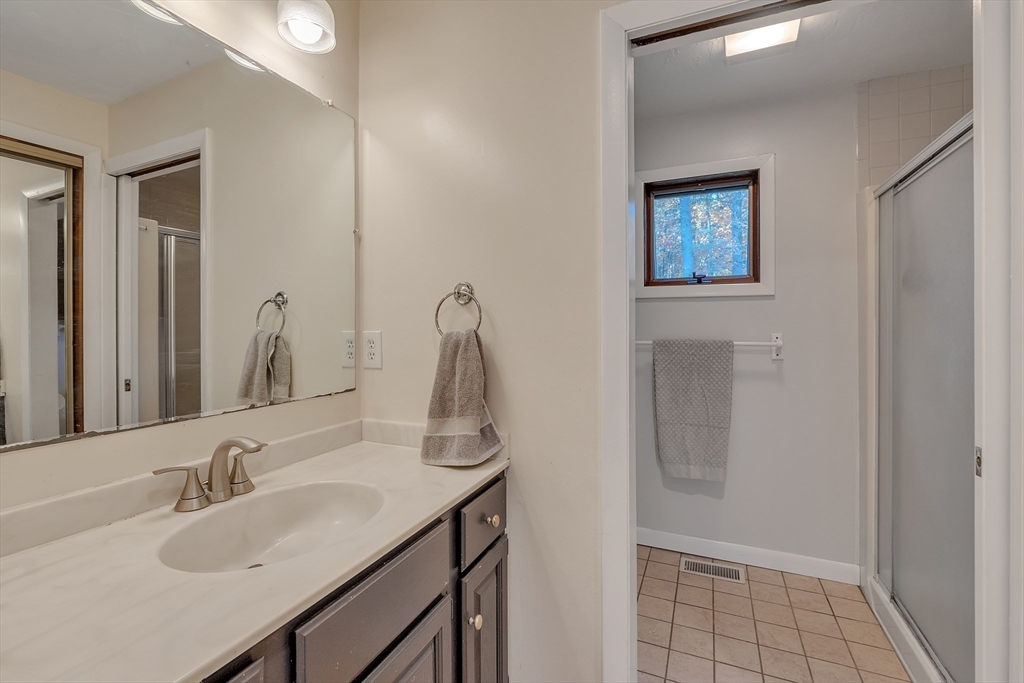 62 Coal Kiln Road Princeton, MA 01541 - Photo 22 of 41 a bathroom with a sink and a mirror