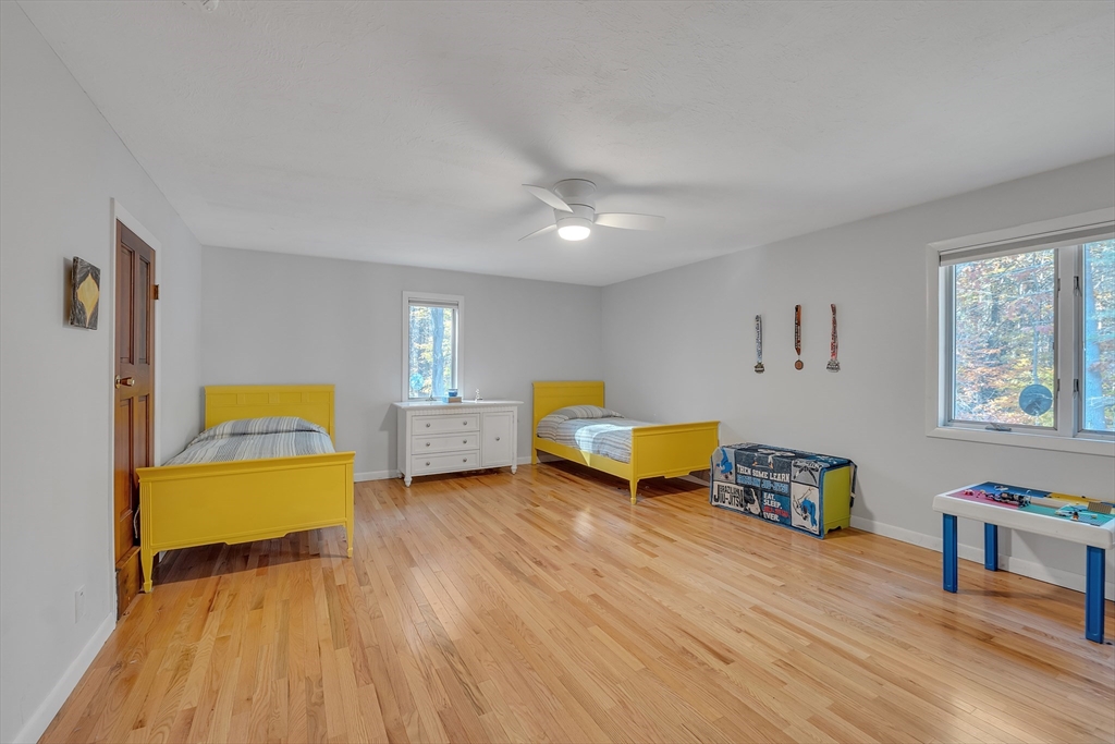 62 Coal Kiln Road Princeton, MA 01541 - Photo 24 of 41 a living room with furniture and a wooden floor