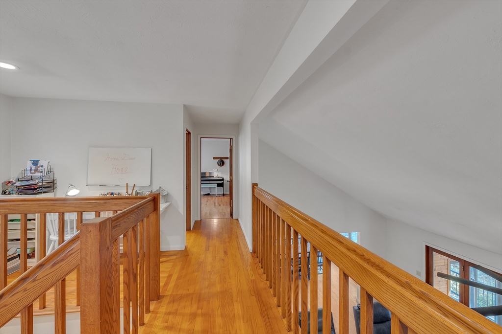 62 Coal Kiln Road Princeton, MA 01541 - Photo 26 of 41 a view of a hallway with wooden floor and stairs