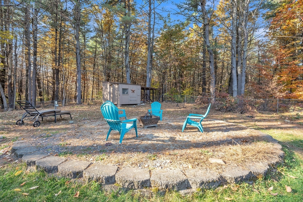 62 Coal Kiln Road Princeton, MA 01541 - Photo 33 of 41 a view of a park with swings and slides
