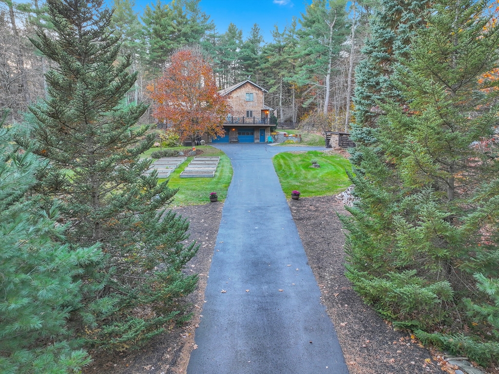 62 Coal Kiln Road Princeton, MA 01541 - Photo 39 of 41 a view of a yard with large trees