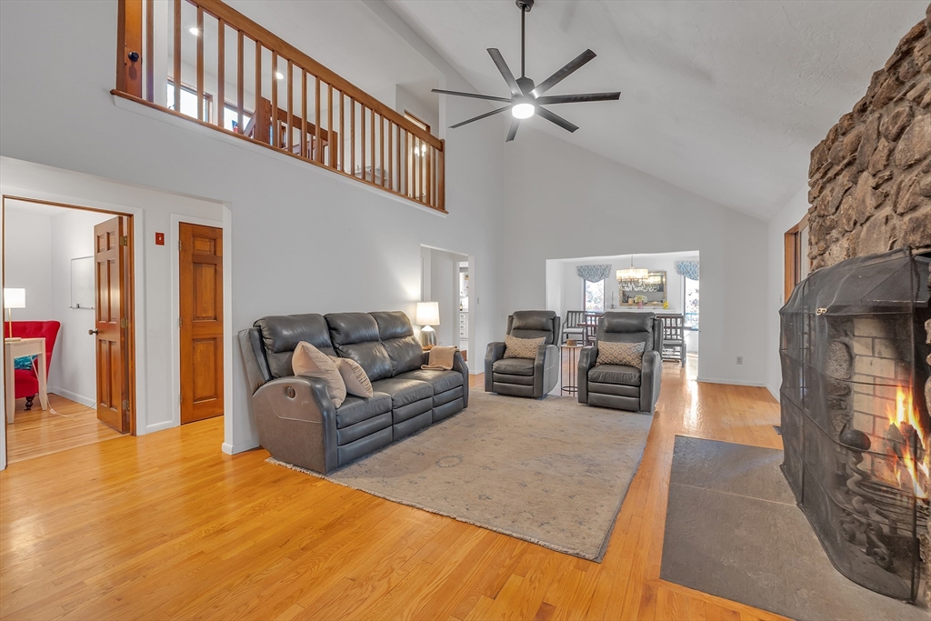 62 Coal Kiln Road Princeton, MA 01541 - Photo 4 of 41 a living room with furniture and a flat screen tv