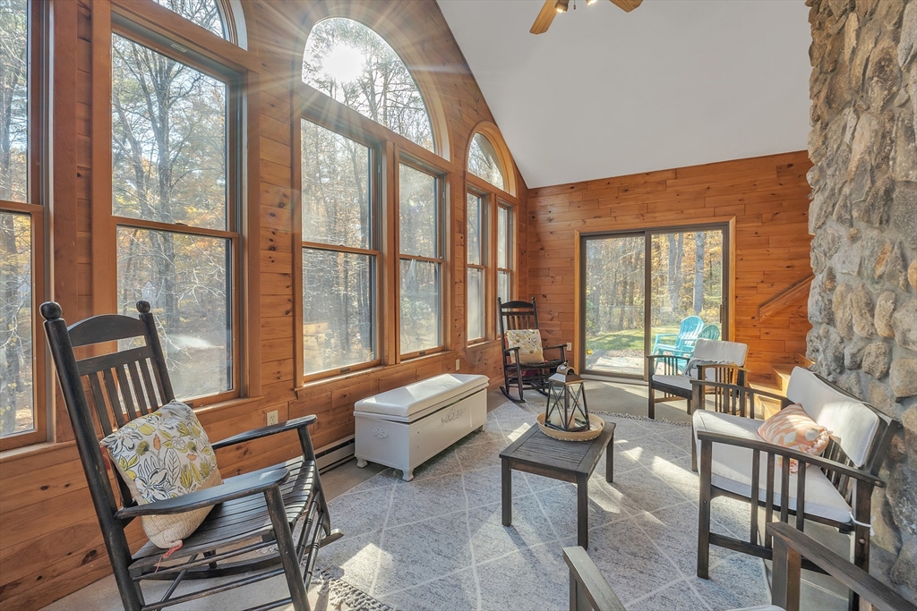 62 Coal Kiln Road Princeton, MA 01541 - Photo 10 of 41 a living room with furniture and a large window