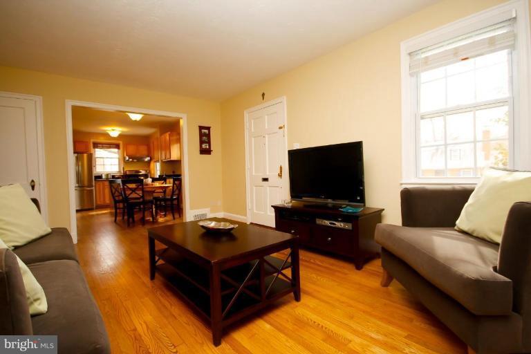 Living room opens to kitchen area