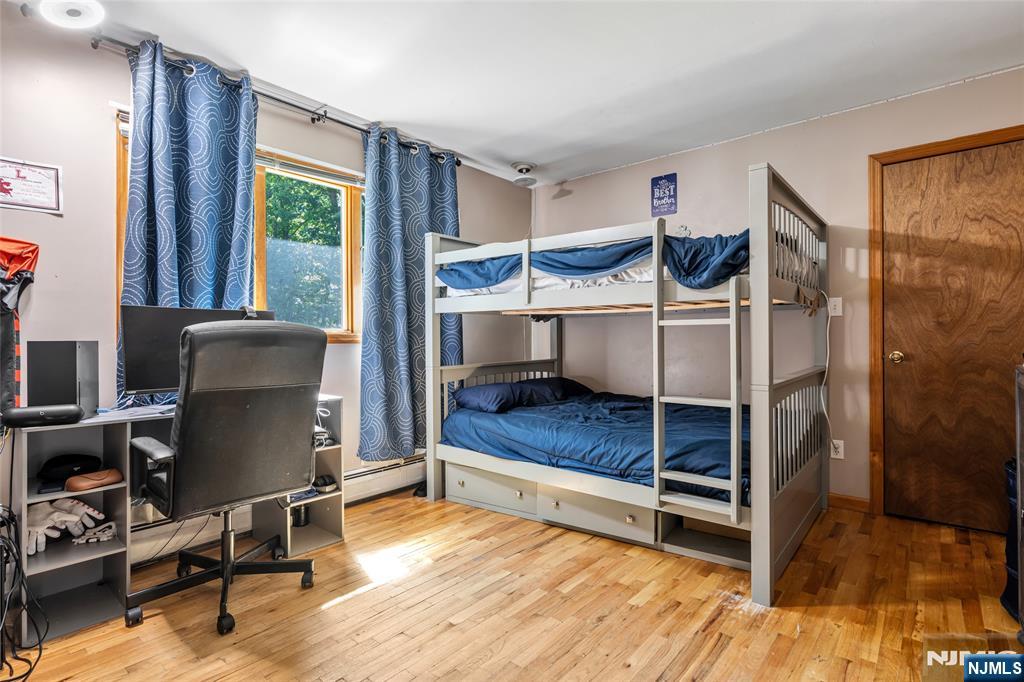 21 Marcia Road Ringwood, NJ 07456 - Photo 21 of 42 a bedroom with bunk bed and a desk