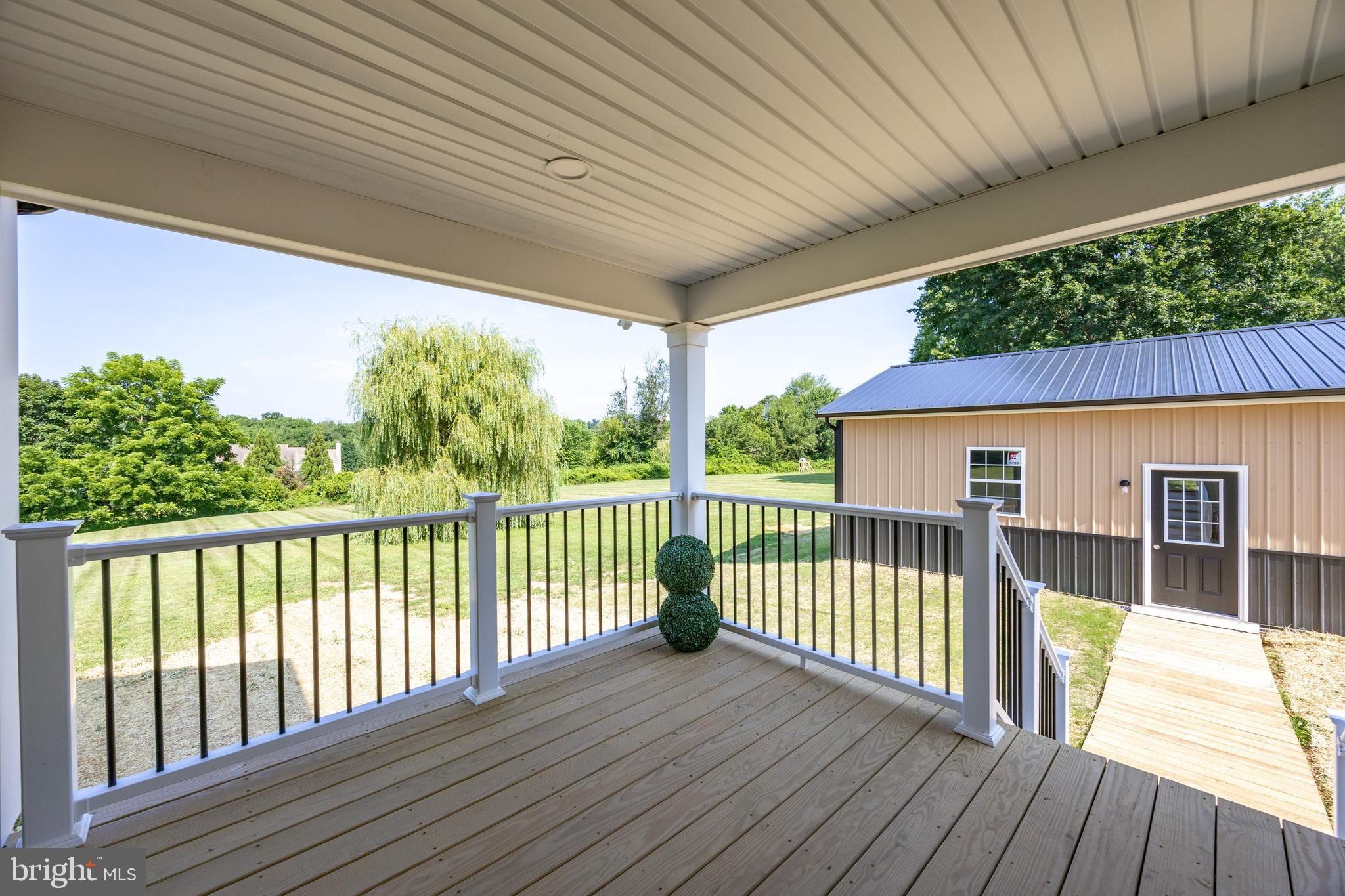 1131 North Manor Road Honey Brook, PA 19344 - Photo 33 of 60 Covered deck and walkway to HUGE, insulated garage