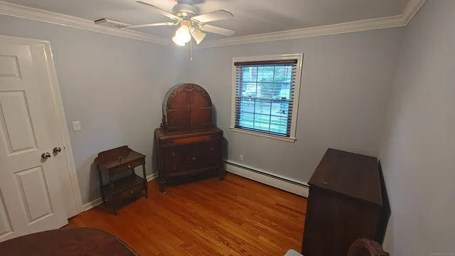 a workspace with furniture and a window