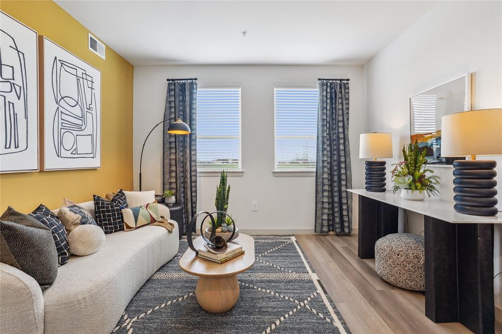 3800 PGA Parkway, Unit 2280 Frisco, TX 75033 - Photo 8 of 21 a living room with furniture and a potted plant