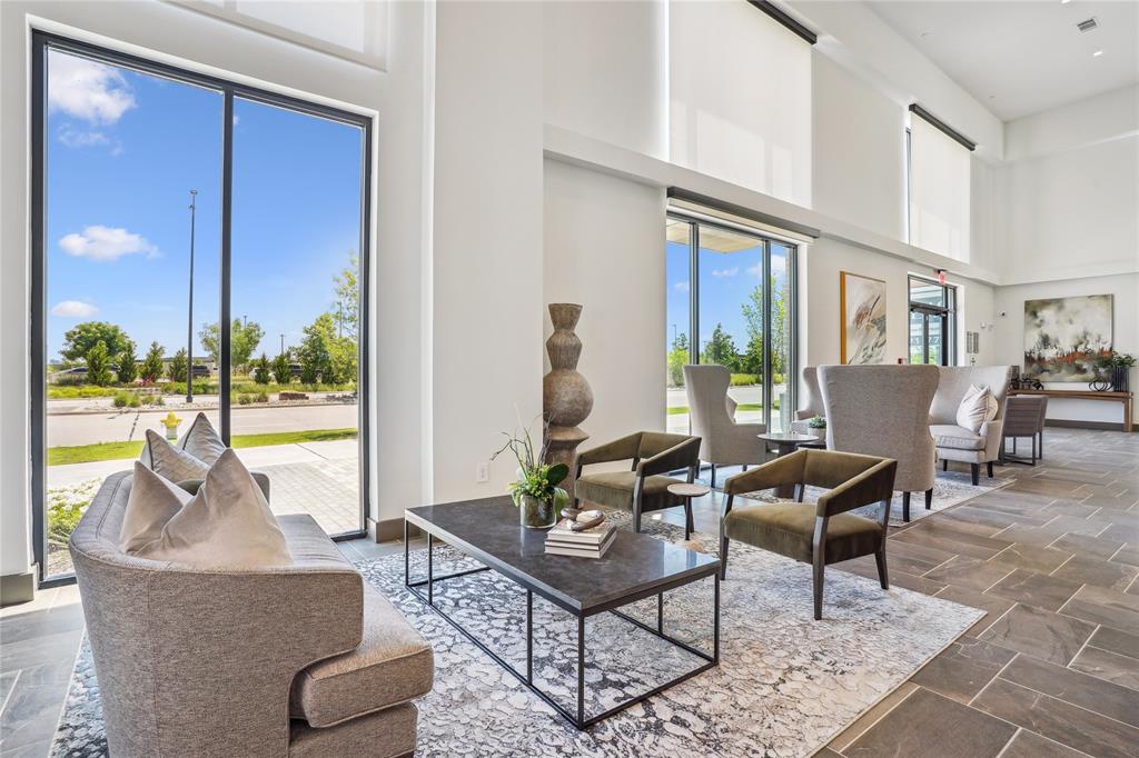 3800 PGA Parkway, Unit 2280 Frisco, TX 75033 - Photo 9 of 21 a living room with furniture and a large window