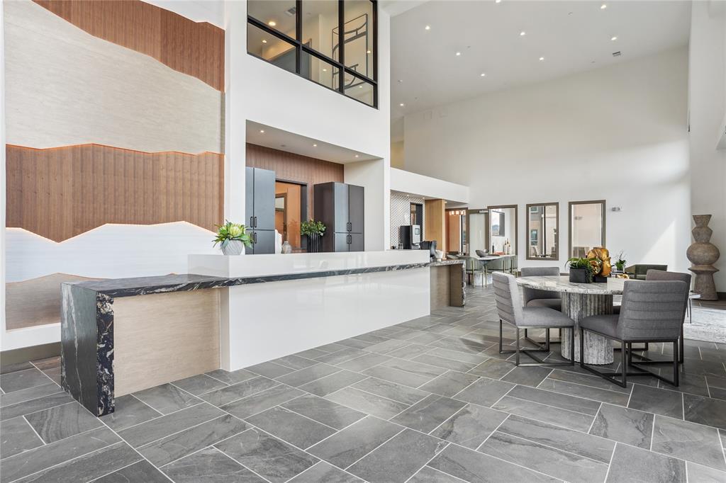 3800 PGA Parkway, Unit 2280 Frisco, TX 75033 - Photo 10 of 21 a living room with granite countertop furniture and a kitchen view