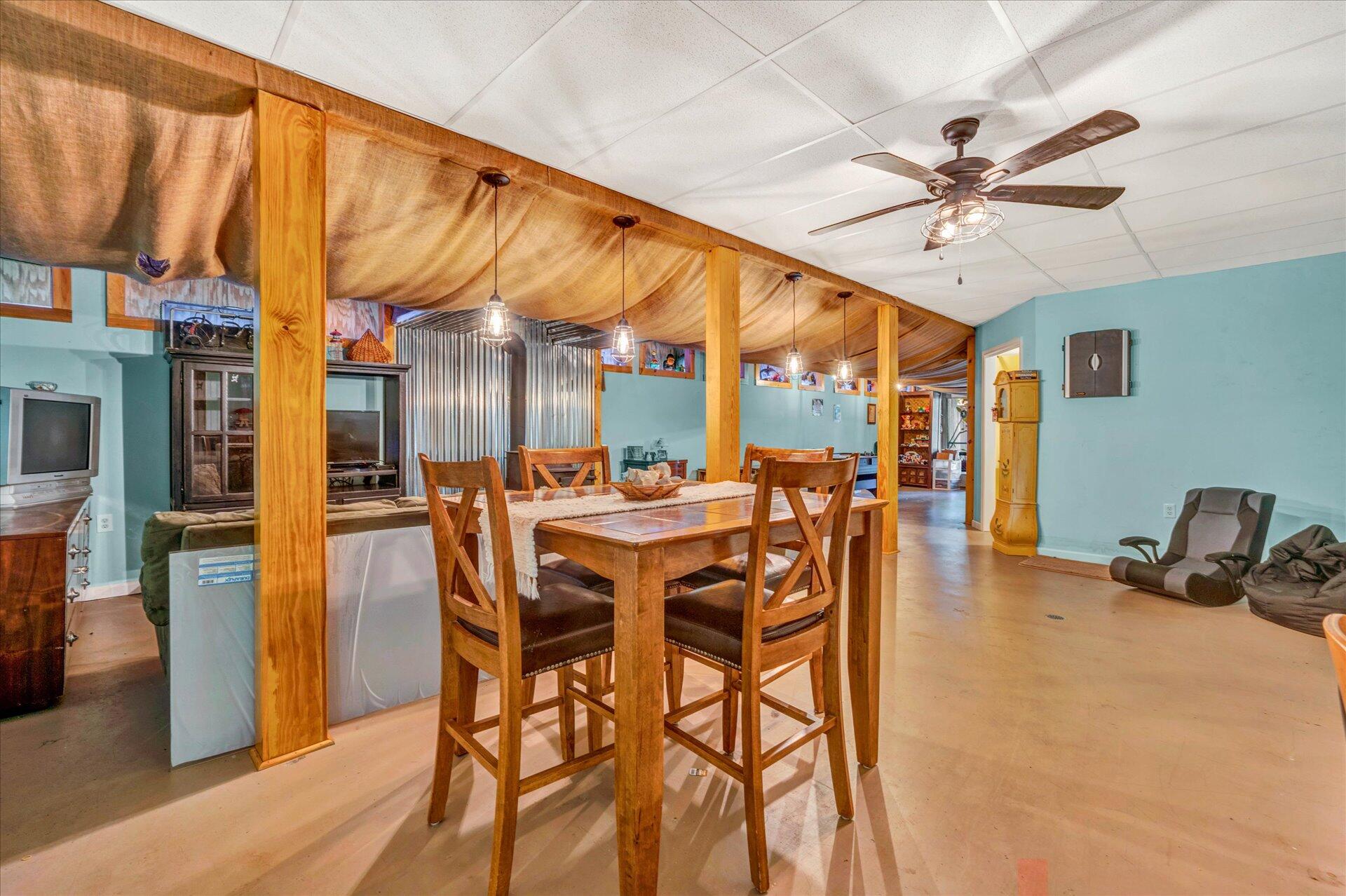 1182 Rabbit Drive Thaxton, VA 24174 - Photo 33 of 58 a dining room with a table and chairs
