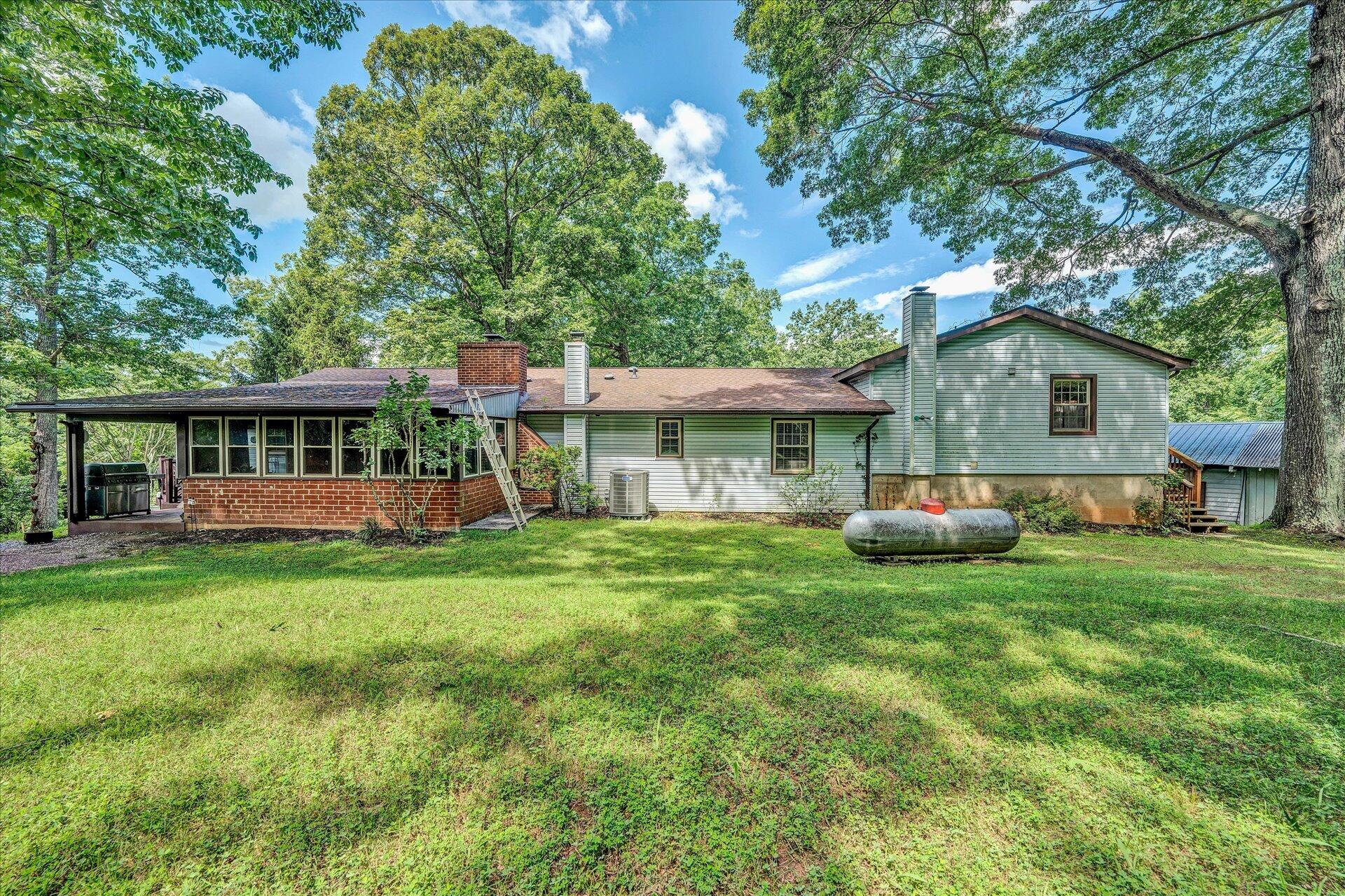 1182 Rabbit Drive Thaxton, VA 24174 - Photo 44 of 58 a view of house with backyard