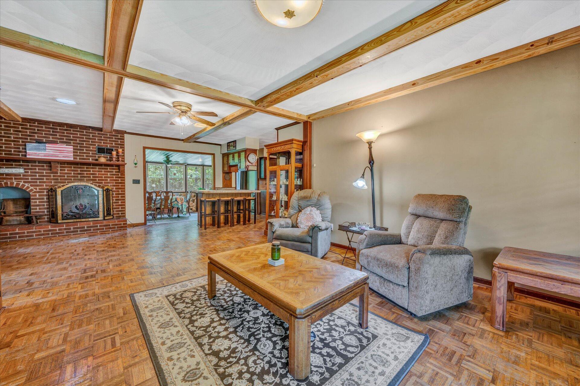 1182 Rabbit Drive Thaxton, VA 24174 - Photo 6 of 58 a living room with furniture and a fireplace