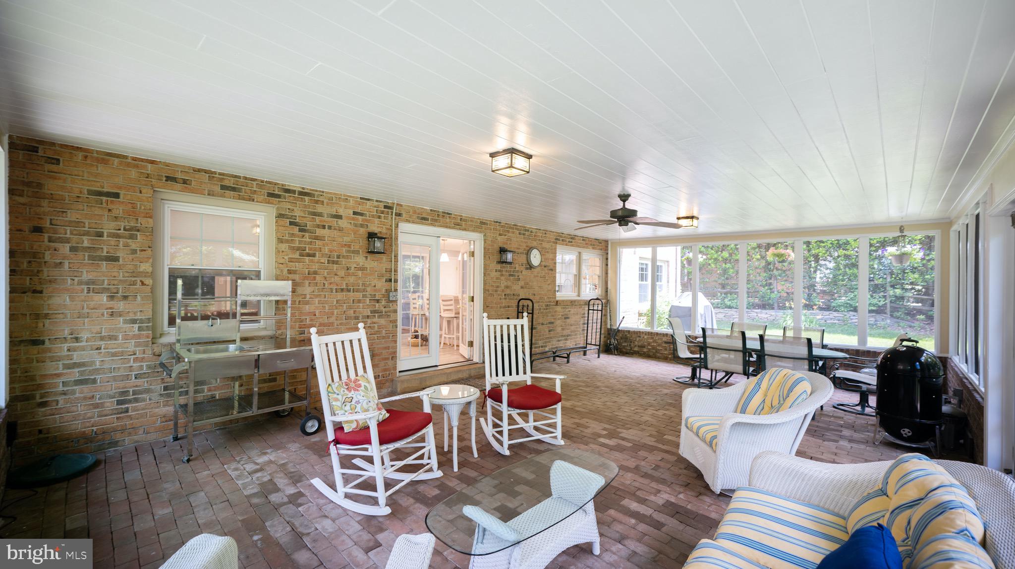 8924 Wooden Bridge Road Potomac, MD 20854 - Photo 15 of 53 Screened in back porch is perfect for entertaining