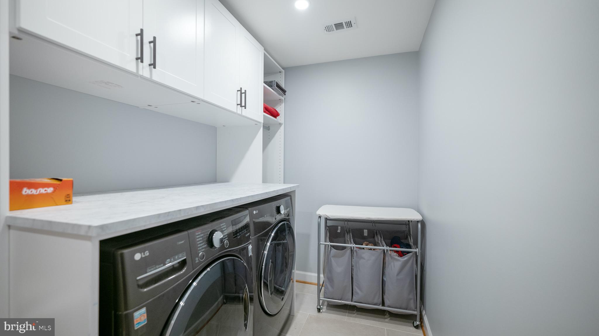 8924 Wooden Bridge Road Potomac, MD 20854 - Photo 25 of 53 Upper level laundry room