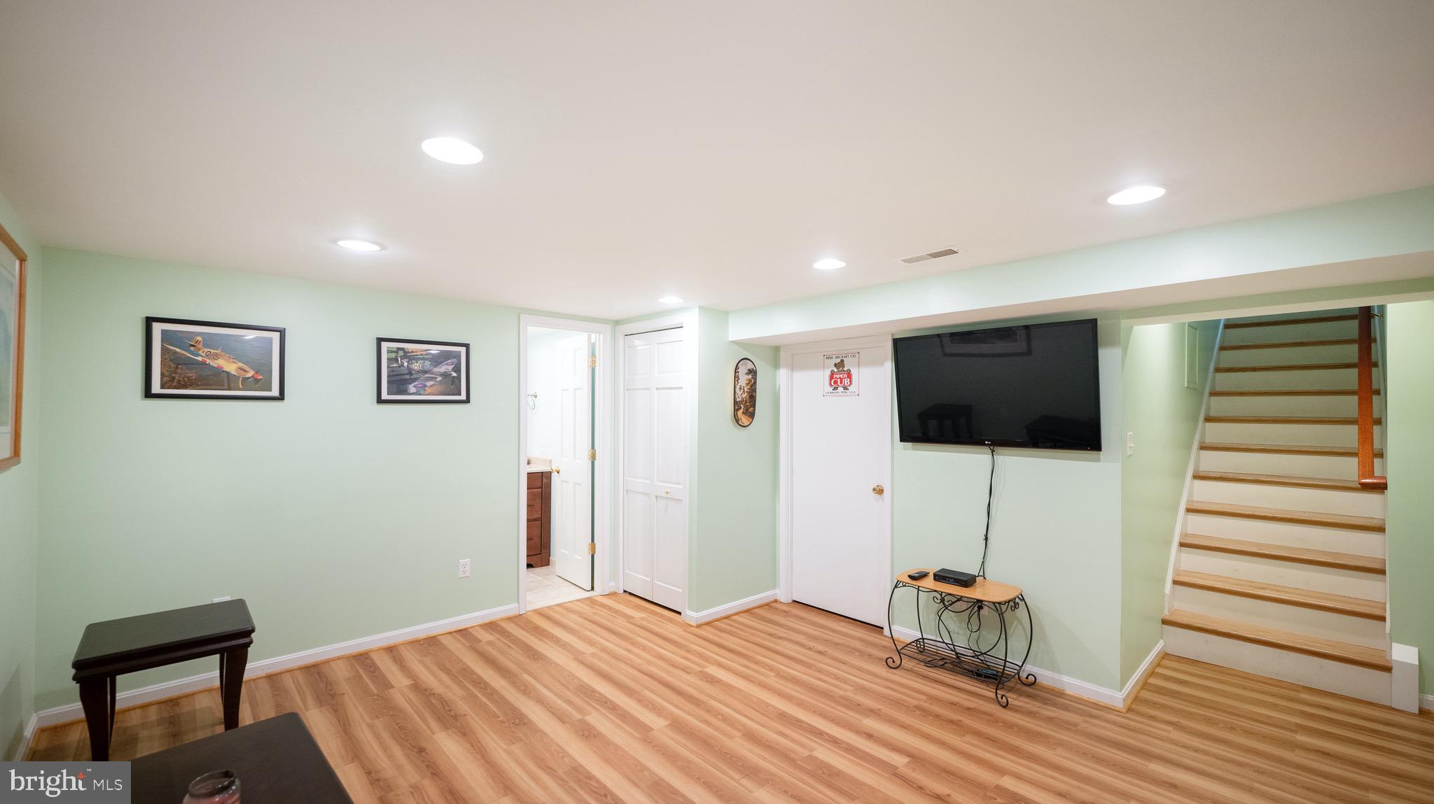 8924 Wooden Bridge Road Potomac, MD 20854 - Photo 31 of 53 Finished basement rec-room