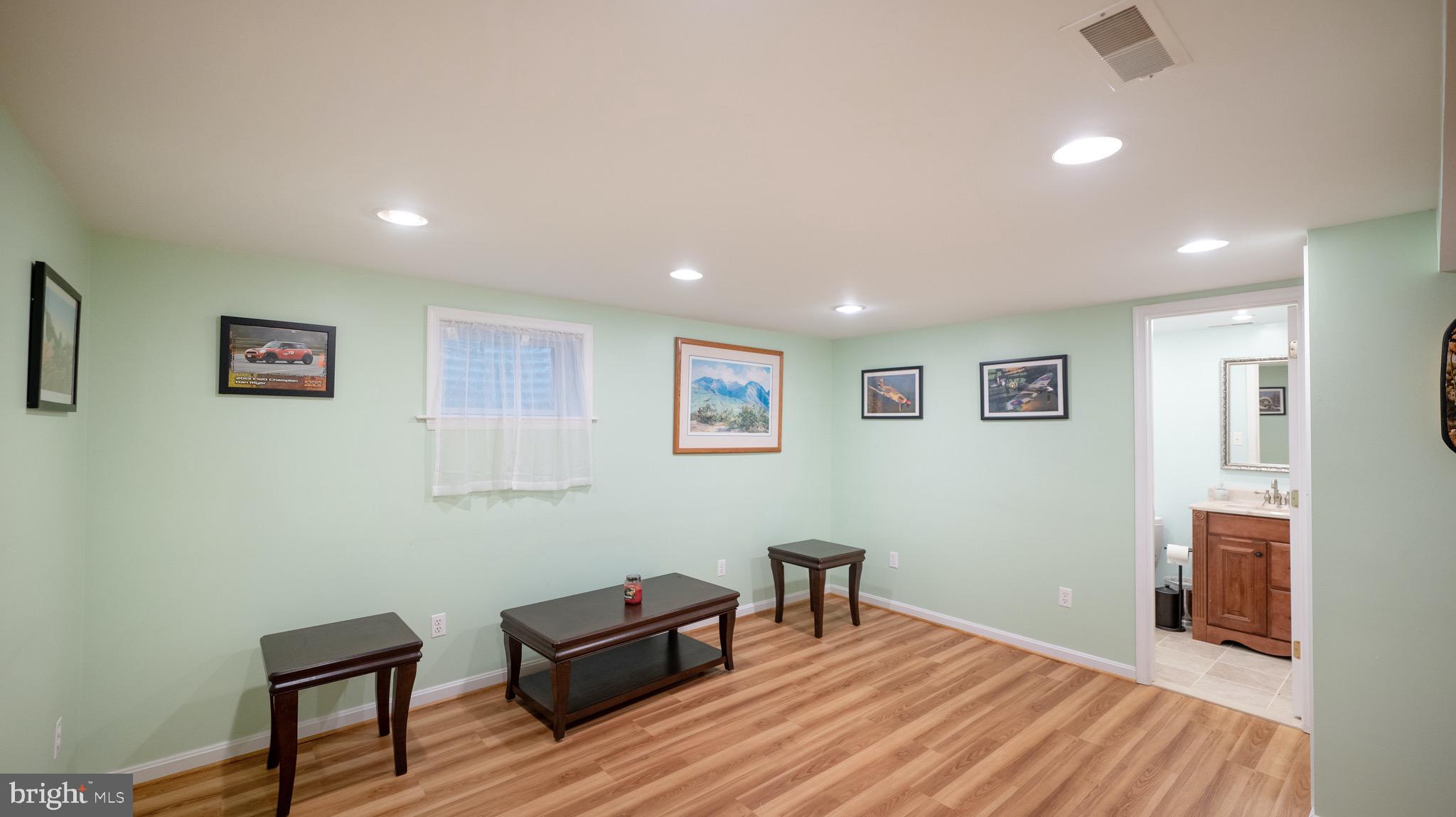 8924 Wooden Bridge Road Potomac, MD 20854 - Photo 32 of 53 Finished basement rec-room