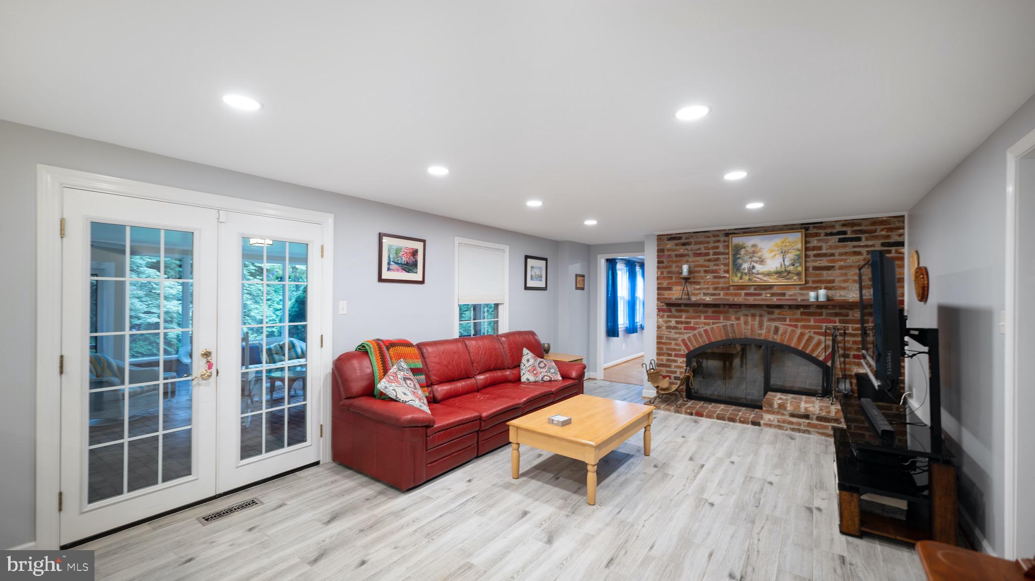 8924 Wooden Bridge Road Potomac, MD 20854 - Photo 6 of 53 Family with double sided fireplace