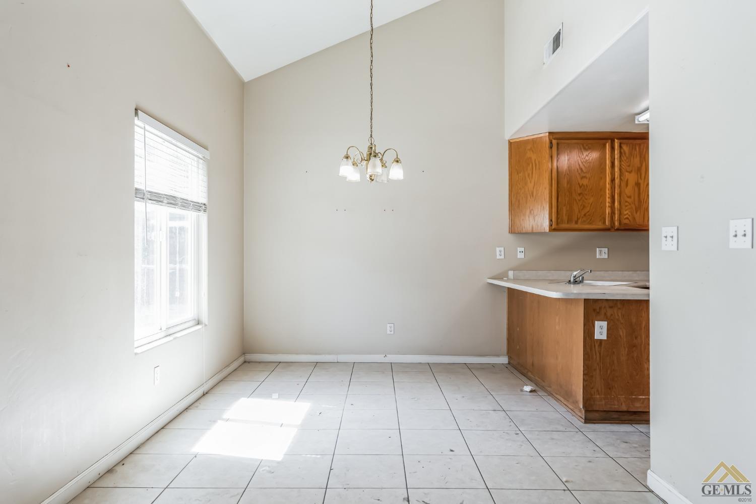 Undisclosed Address Bakersfield, CA 93307 - Photo 4 of 6 a view of kitchen and window