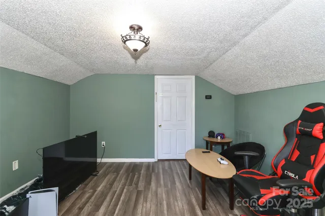 a bed room with furniture and decor