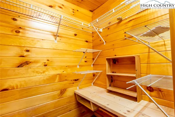 a view of a gym with wooden floor