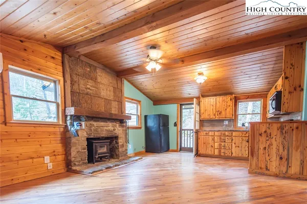 a view of a livingroom with a fireplace