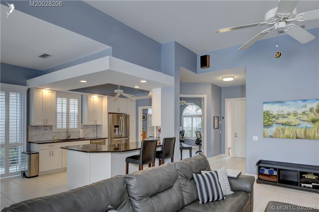 1530 Southwest Balmoral Trace Stuart, FL 34997 - Photo 11 of 48 Kitchen, Den entry and front door
