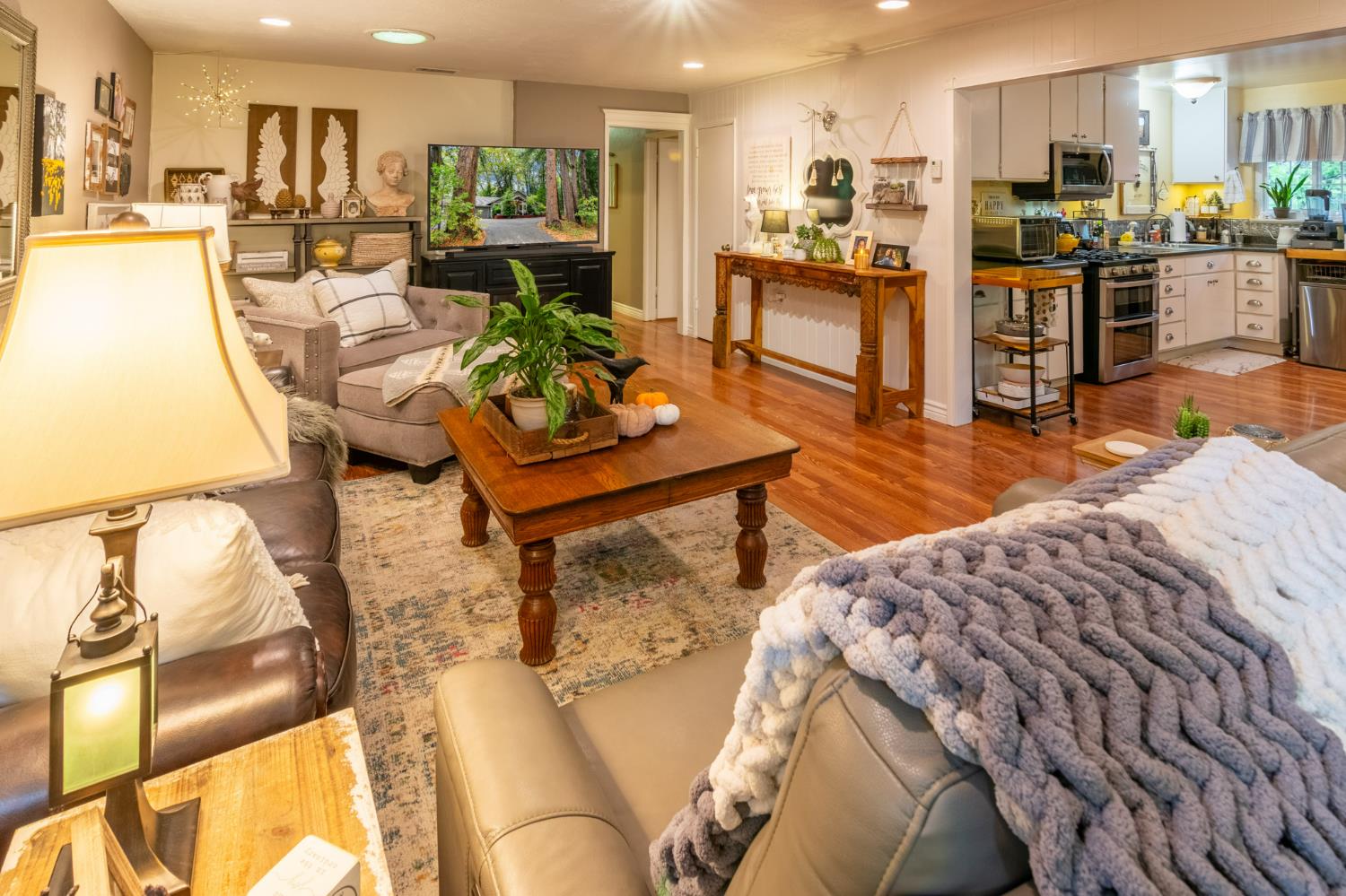 25681 Foresthill Road Foresthill, CA 95631 - Photo 2 of 29 a living room with stainless steel appliances kitchen island granite countertop furniture and a kitchen view