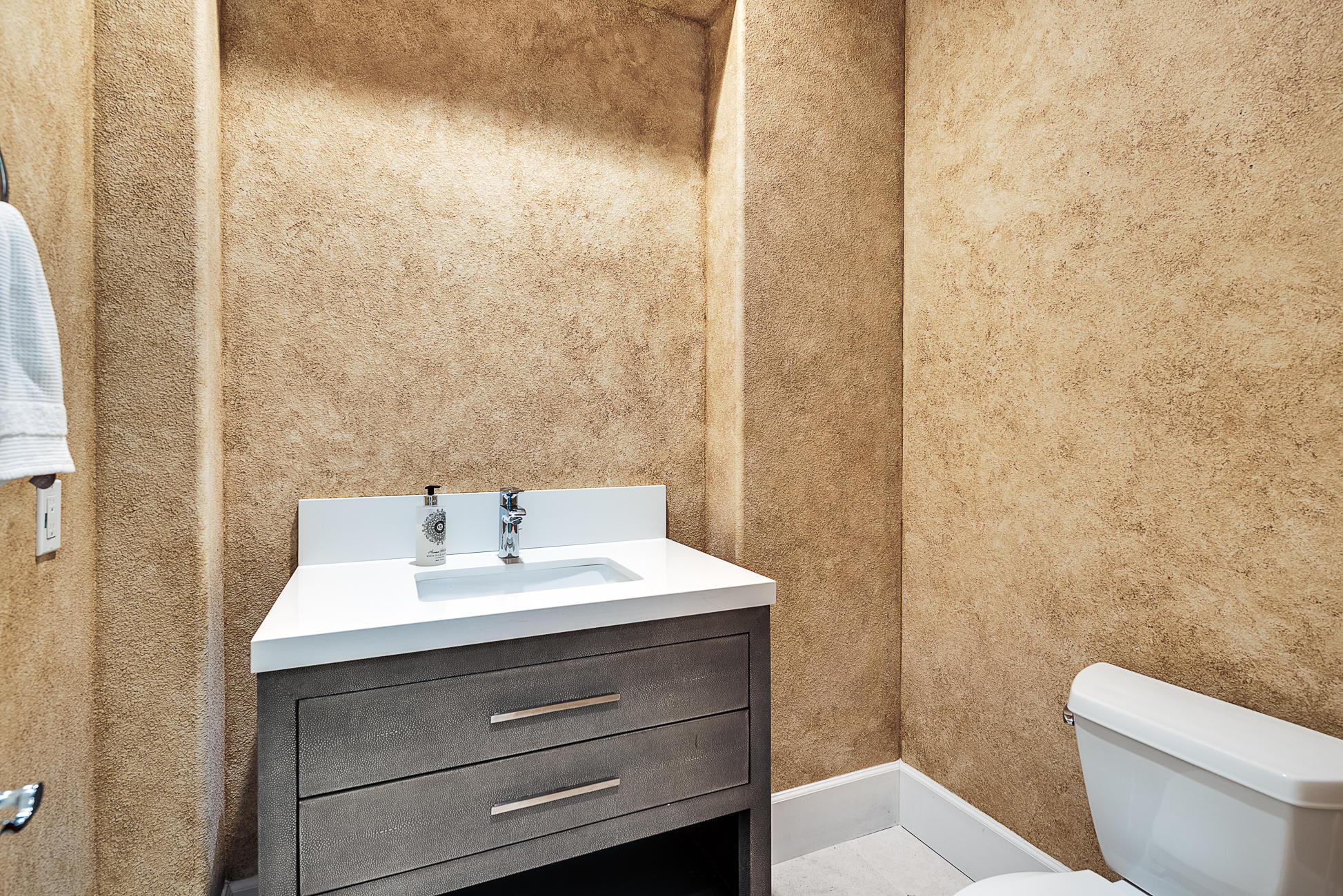 20 Vía Bella Rancho Mirage, CA 92270 - Photo 11 of 26 a bathroom with a sink a toilet and mirror
