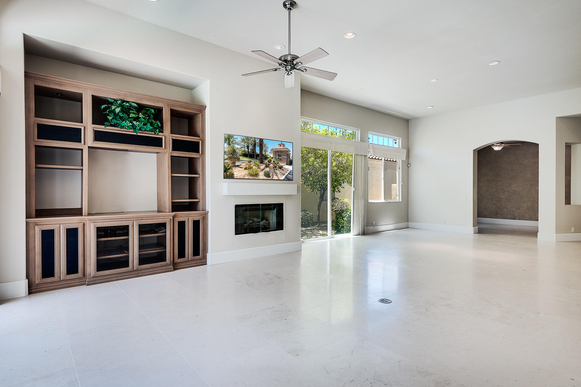 20 Vía Bella Rancho Mirage, CA 92270 - Photo 14 of 26 a view of a livingroom with a ceiling fan and window