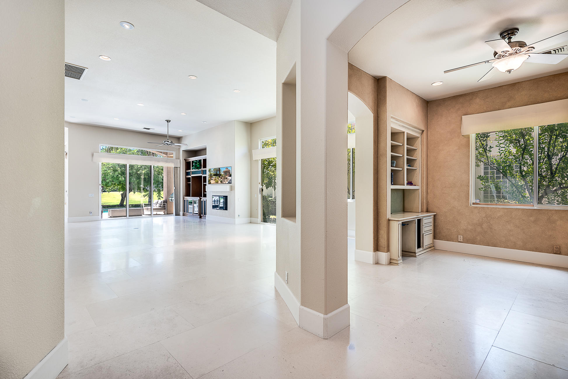 20 Vía Bella Rancho Mirage, CA 92270 - Photo 10 of 26 wooden floor in an empty room with a window