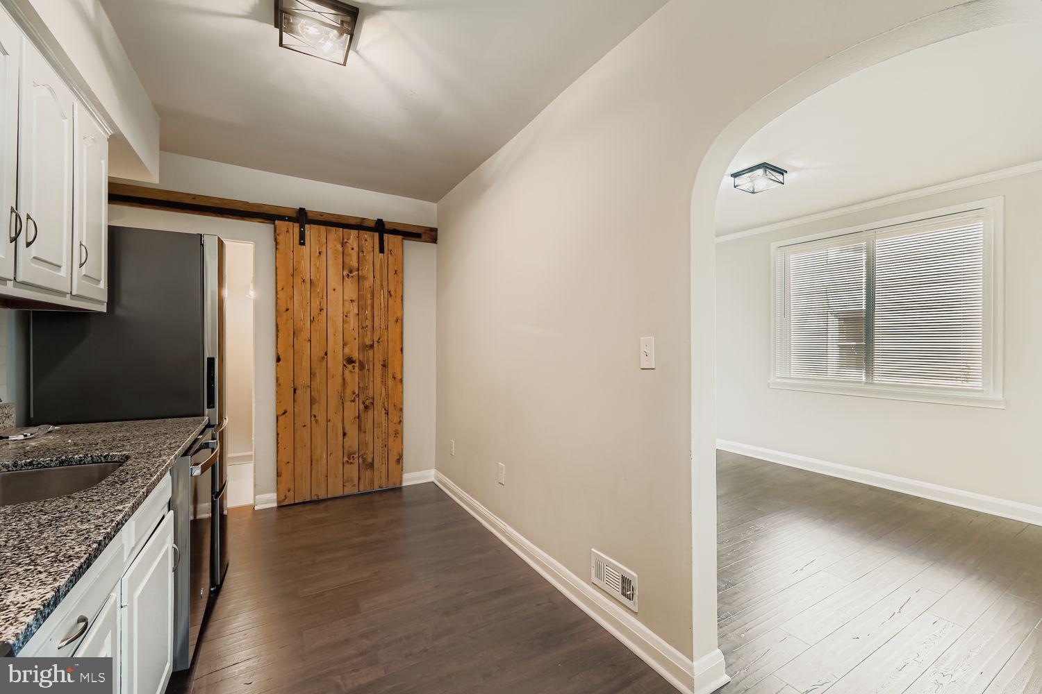 3711 Ina Avenue Baltimore, MD 21206 - Photo 11 of 29 a view of a kitchen cabinets and wooden floor