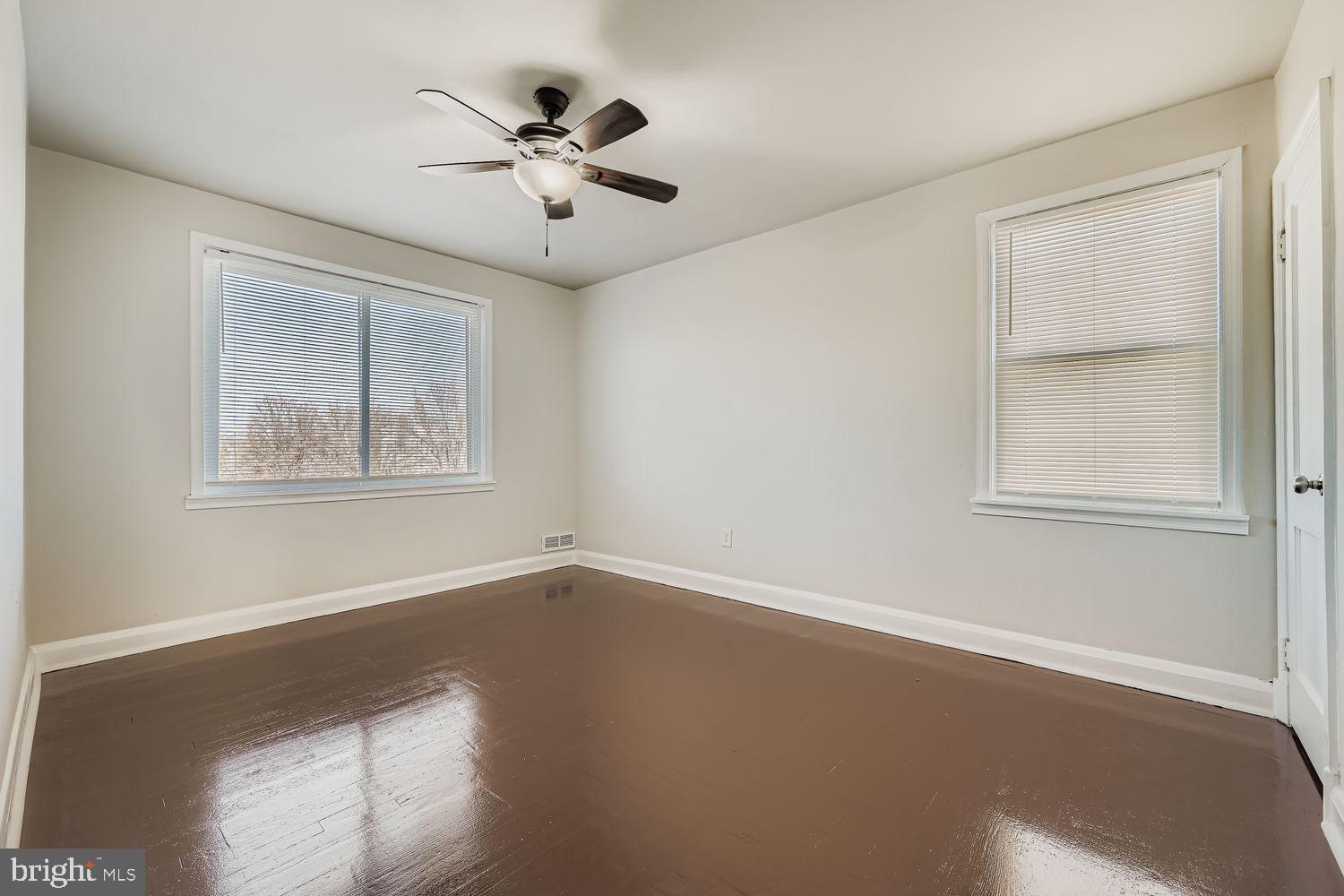3711 Ina Avenue Baltimore, MD 21206 - Photo 13 of 29 a view of room with window and ceiling fan