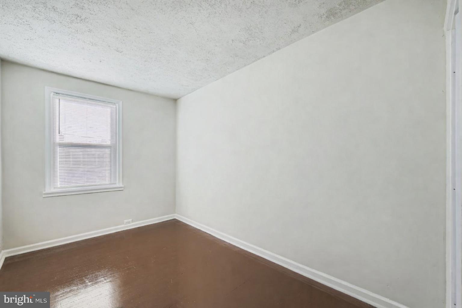 3711 Ina Avenue Baltimore, MD 21206 - Photo 18 of 29 an empty room with a window