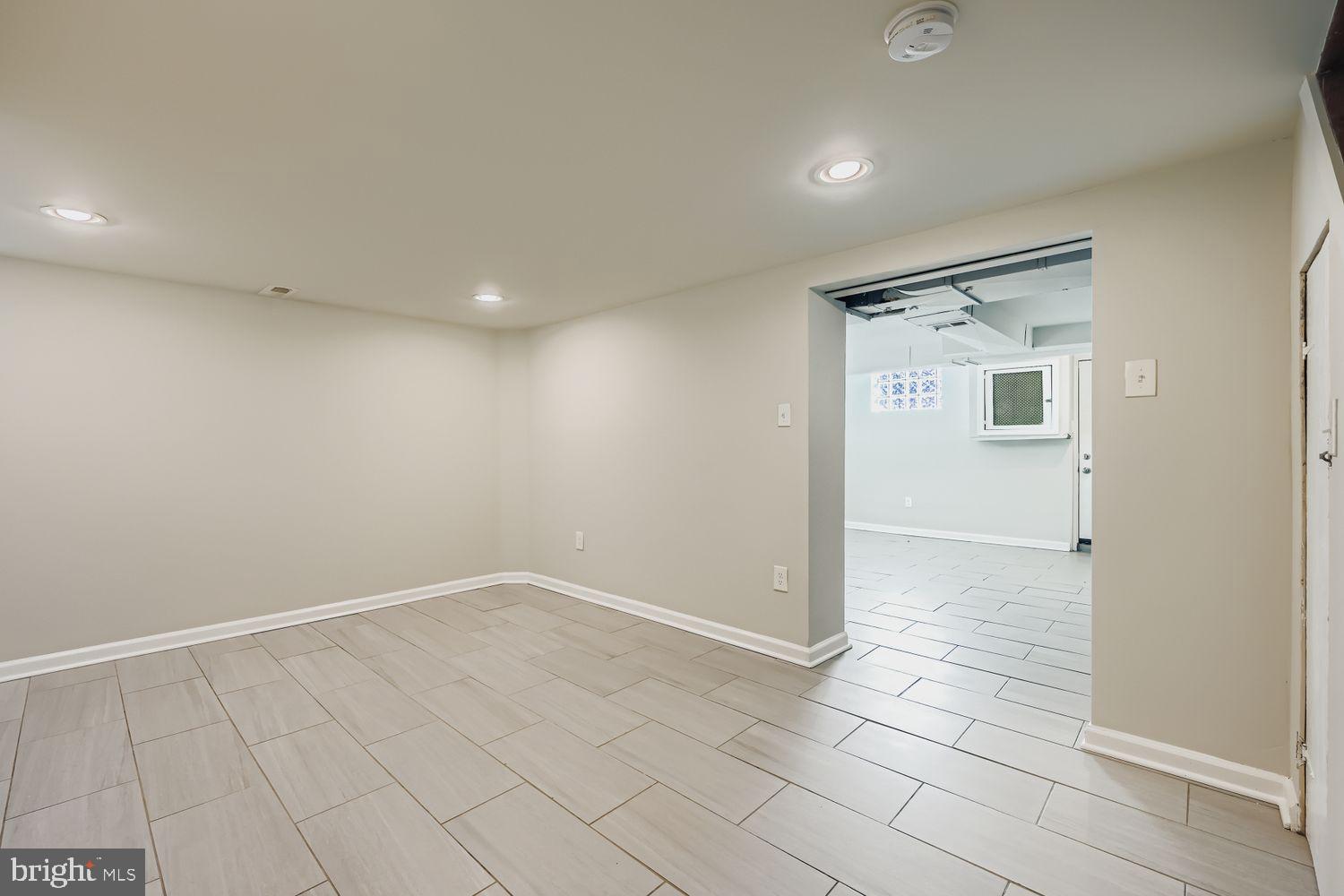 3711 Ina Avenue Baltimore, MD 21206 - Photo 21 of 29 an empty room with windows