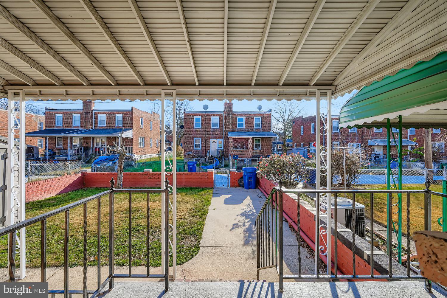 3711 Ina Avenue Baltimore, MD 21206 - Photo 26 of 29 a view of a living room and balcony