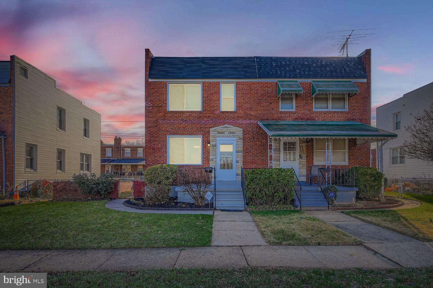 3711 Ina Avenue Baltimore, MD 21206 - Photo 29 of 29 a front view of a house with a yard