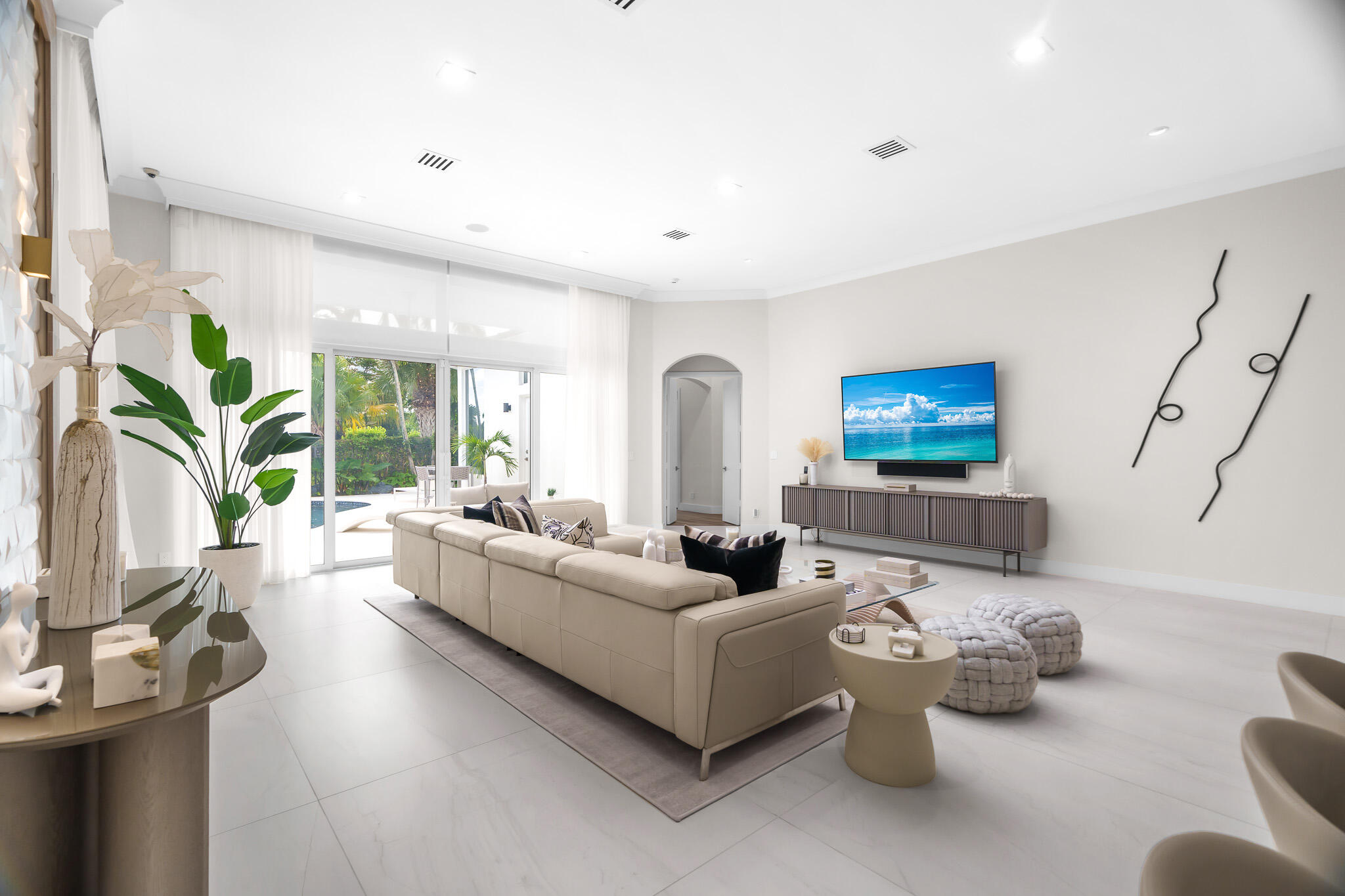 7952 Trieste Place Delray Beach, FL 33446 - Photo 13 of 59 a living room with furniture and a flat screen tv