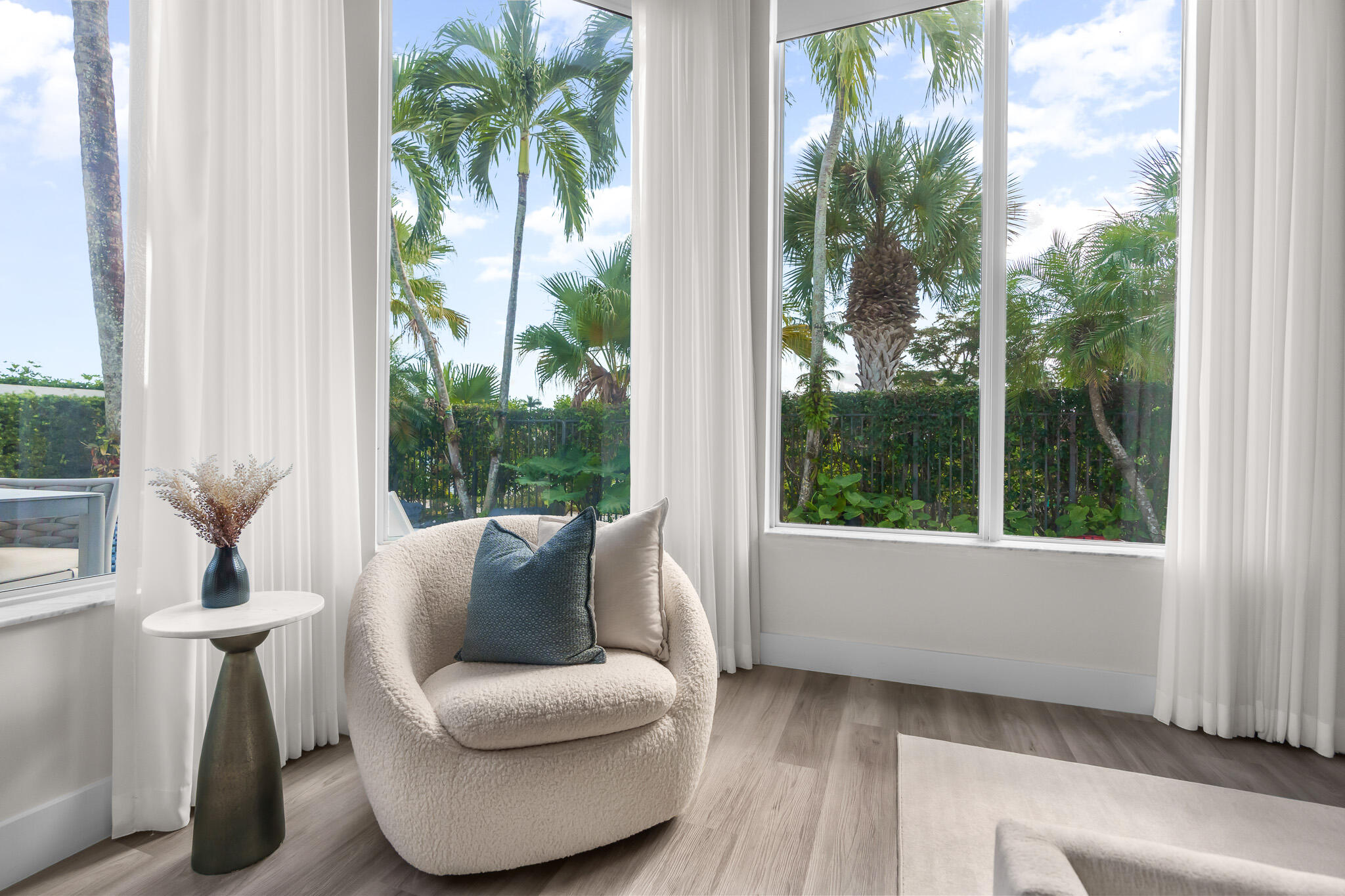 7952 Trieste Place Delray Beach, FL 33446 - Photo 18 of 59 a living room with furniture and a potted plant