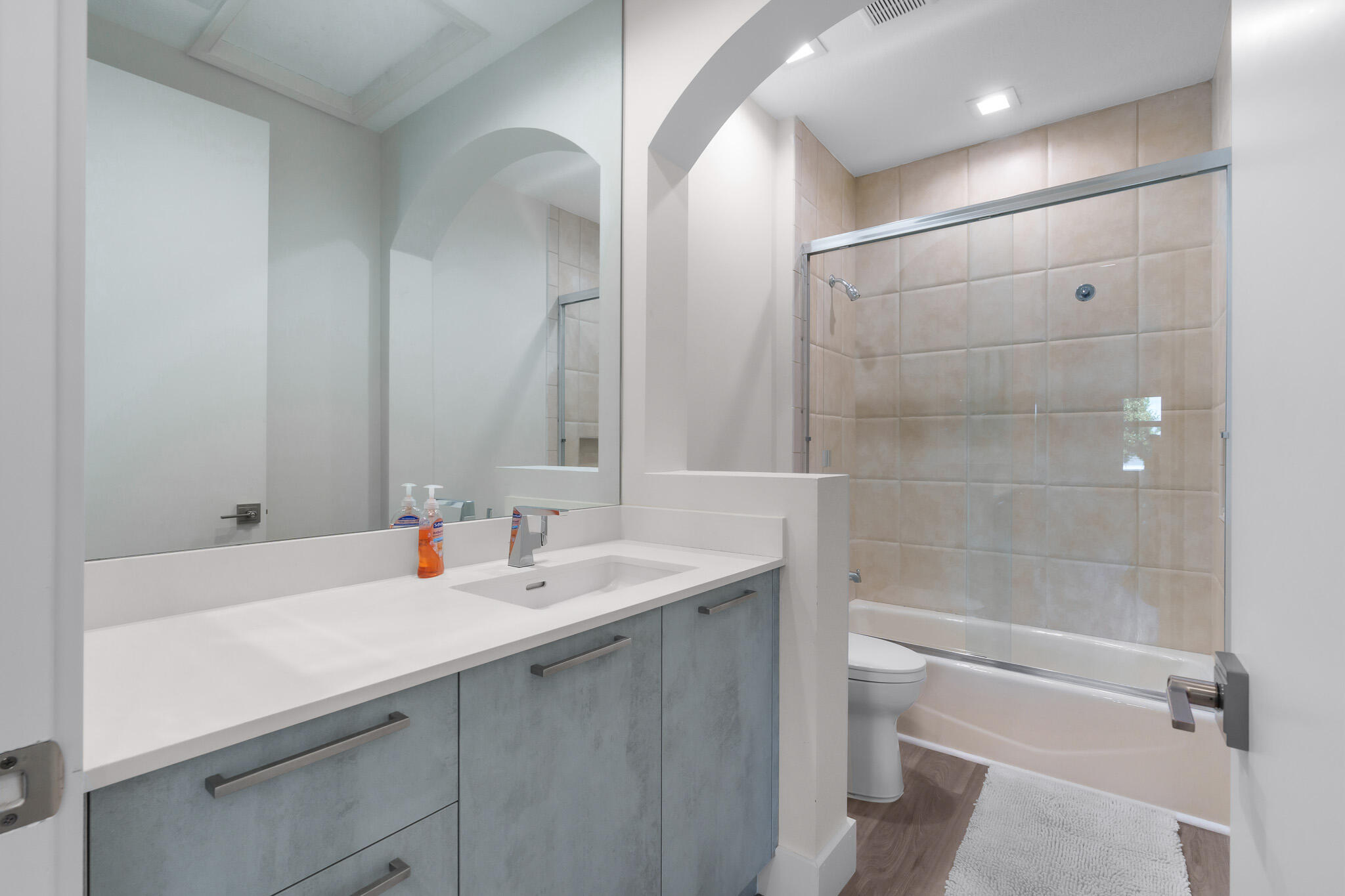 7952 Trieste Place Delray Beach, FL 33446 - Photo 33 of 59 a bathroom with a sink mirror toilet and bathtub