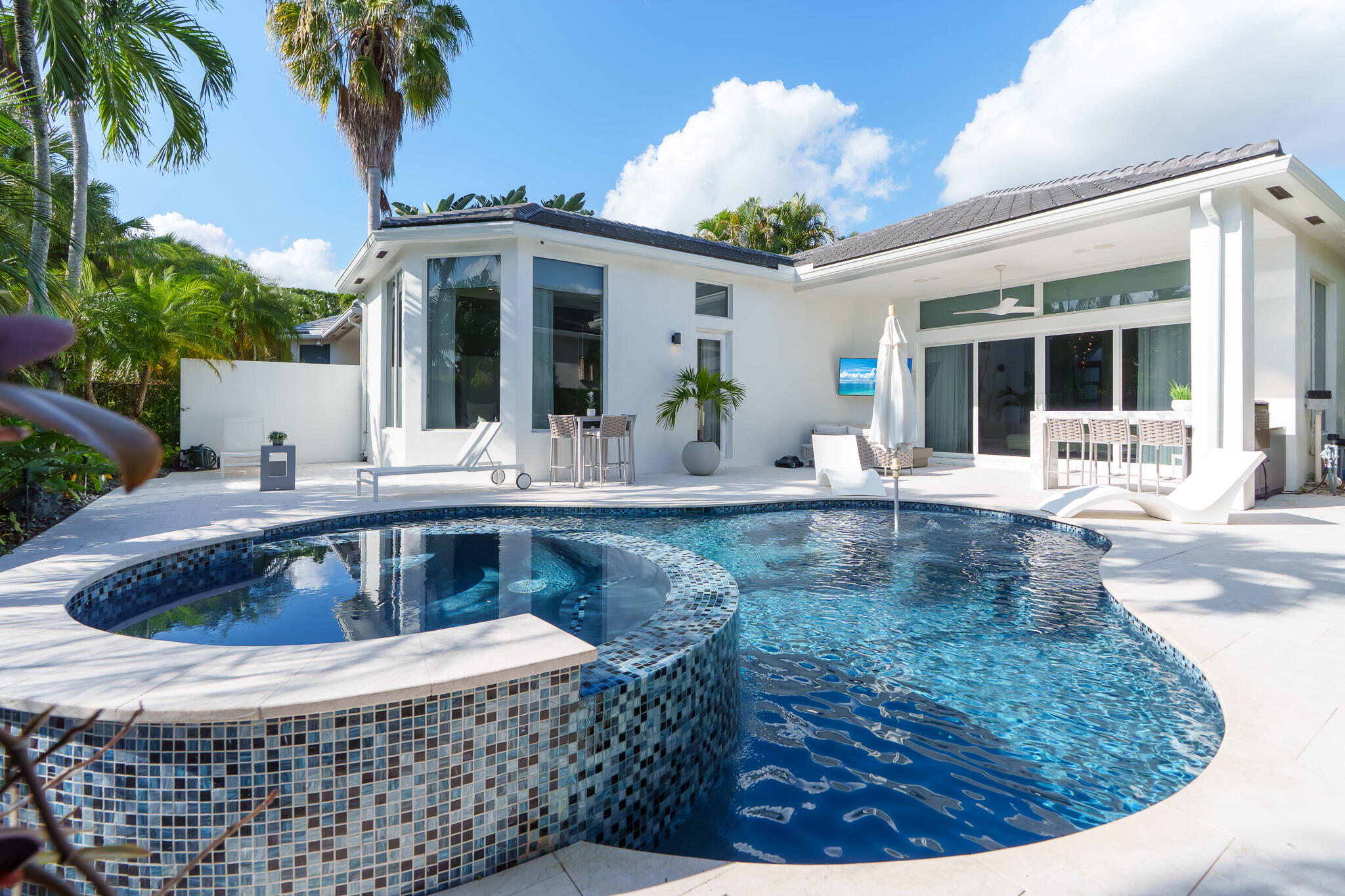 7952 Trieste Place Delray Beach, FL 33446 - Photo 40 of 59 a view of house with outdoor seating space