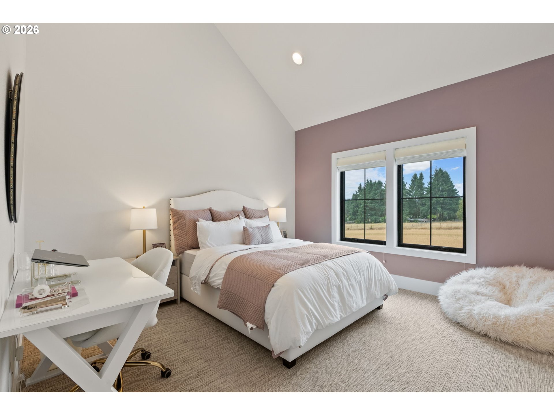 22280 Southwest Stafford Road Tualatin, OR 97062 - Photo 28 of 48 a bedroom with a bed and a large window